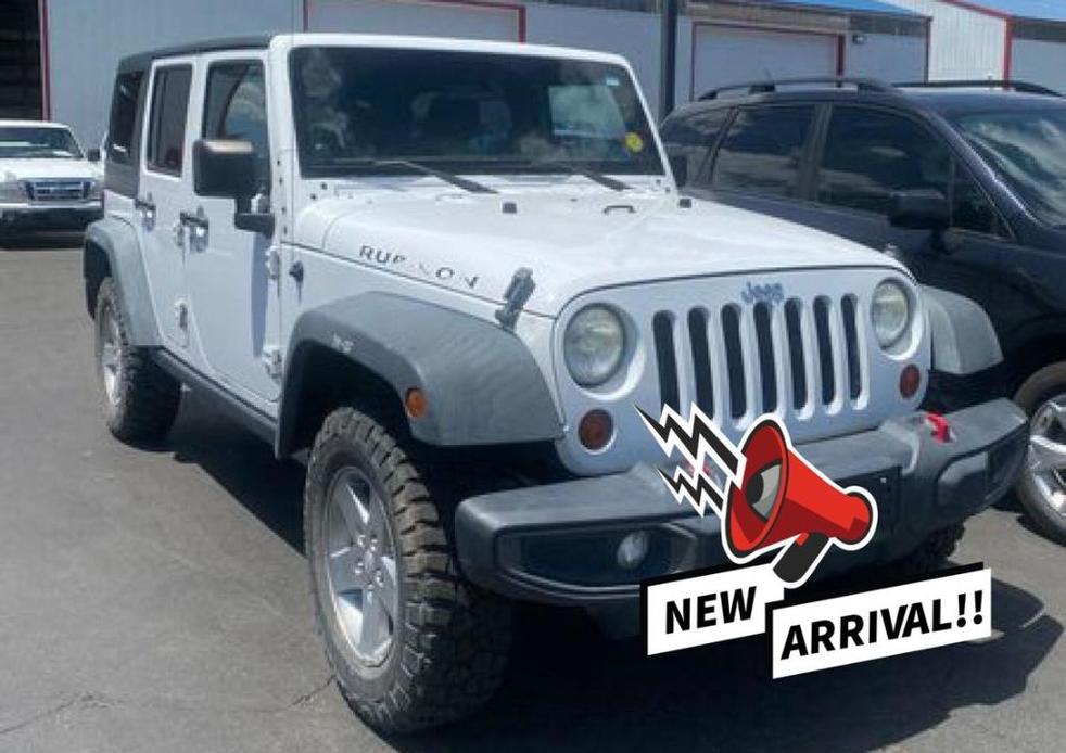 used 2011 Jeep Wrangler Unlimited car, priced at $23,995