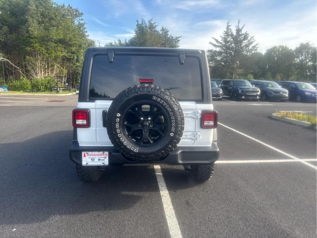 used 2021 Jeep Wrangler Unlimited car, priced at $25,972