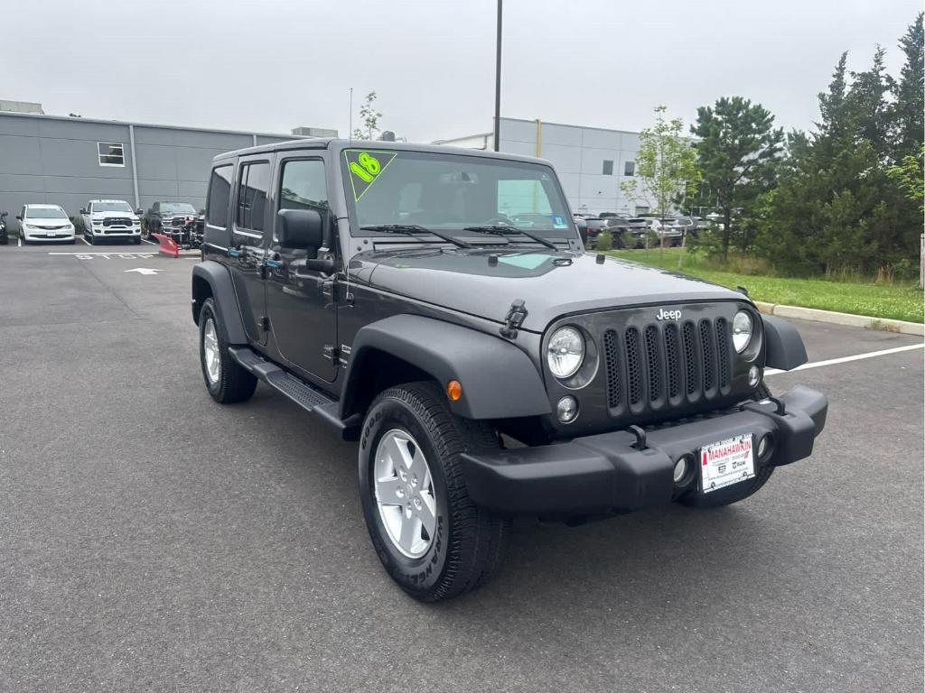used 2018 Jeep Wrangler JK Unlimited car, priced at $21,472