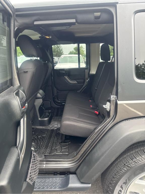used 2018 Jeep Wrangler JK Unlimited car, priced at $21,472