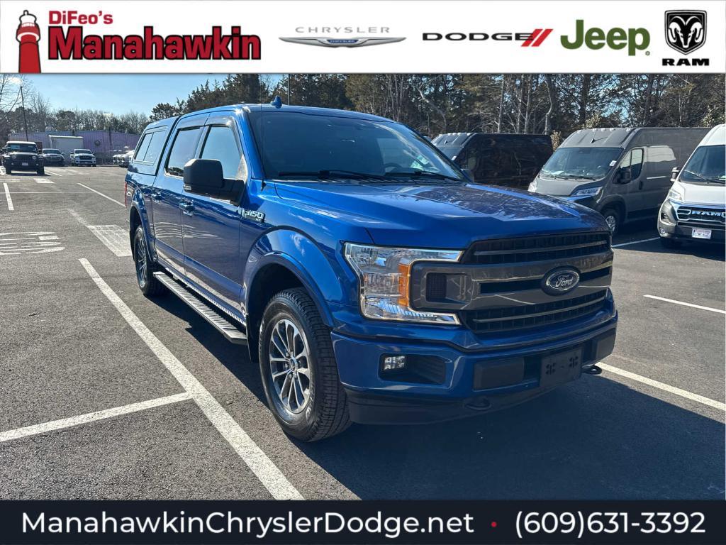 used 2018 Ford F-150 car, priced at $28,972