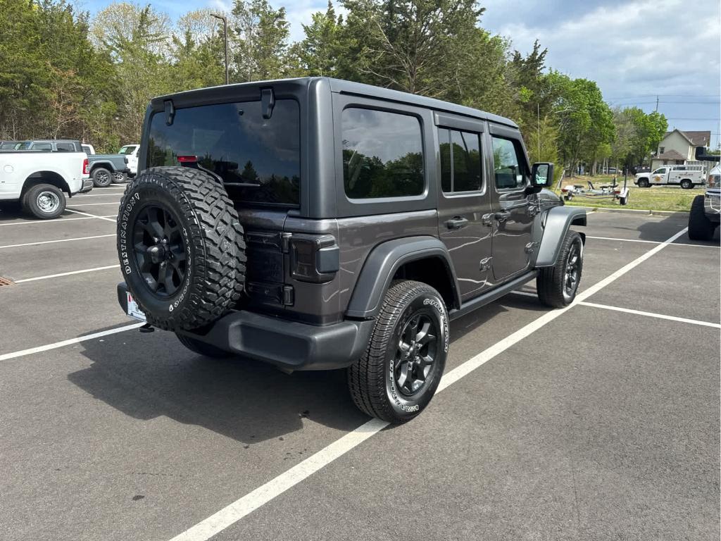 used 2021 Jeep Wrangler Unlimited car, priced at $32,472
