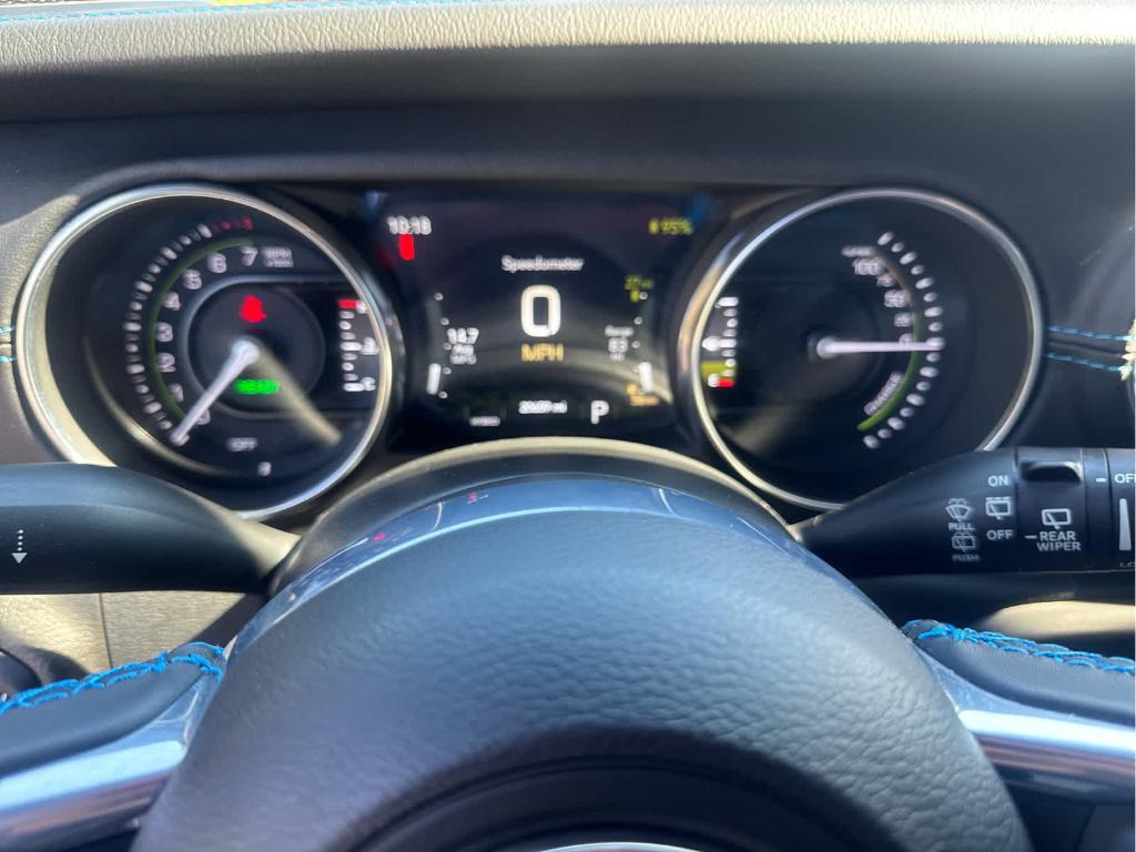 used 2023 Jeep Wrangler 4xe car, priced at $40,972
