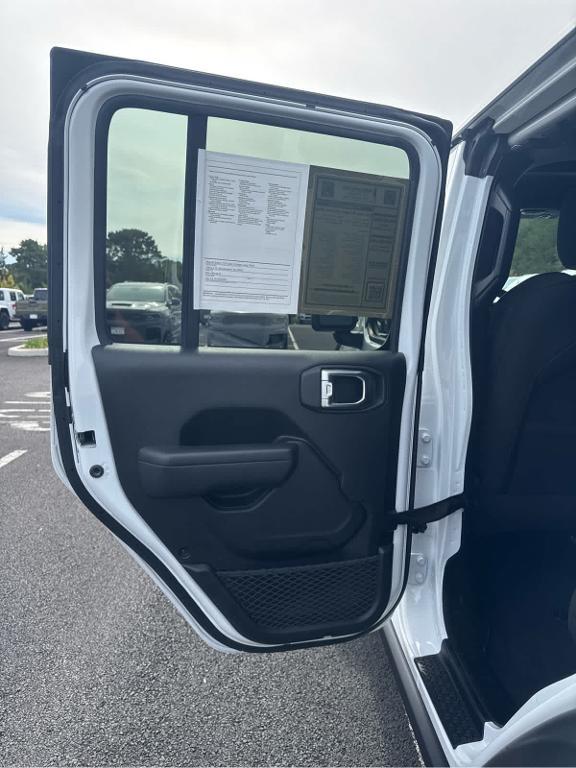 used 2022 Jeep Wrangler Unlimited car, priced at $33,972