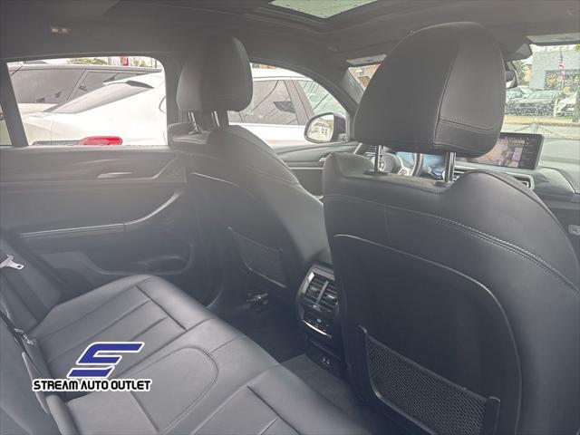 used 2023 BMW X4 car, priced at $43,990