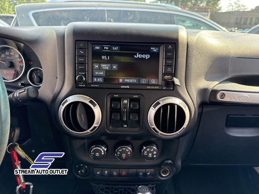used 2016 Jeep Wrangler Unlimited car, priced at $18,985