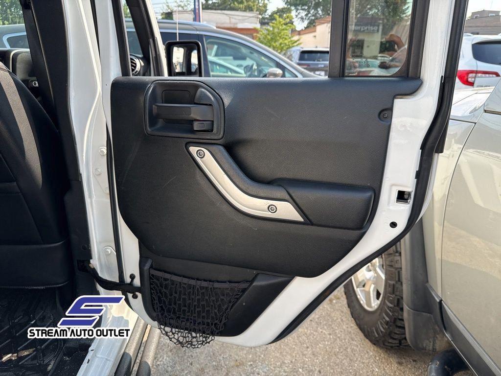 used 2016 Jeep Wrangler Unlimited car, priced at $18,985