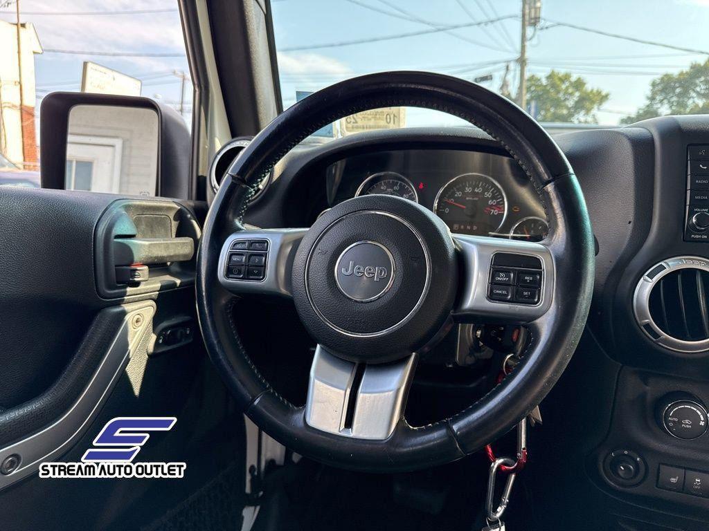 used 2016 Jeep Wrangler Unlimited car, priced at $18,985