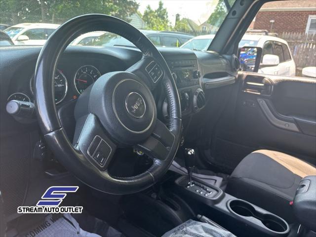 used 2017 Jeep Wrangler Unlimited car, priced at $15,990
