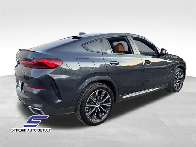 used 2022 BMW X6 car, priced at $56,490