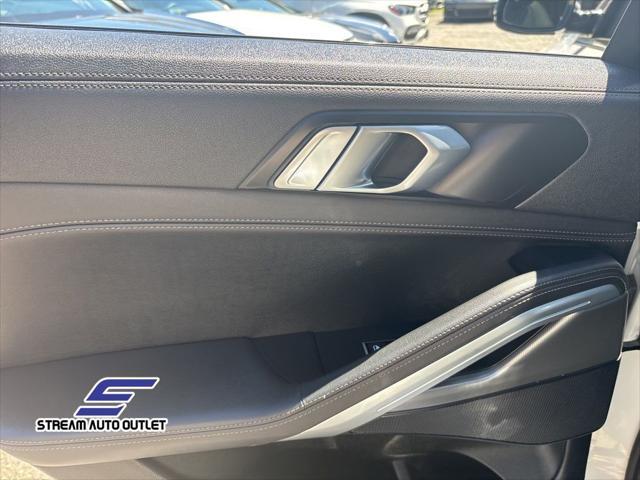 used 2023 BMW X6 car, priced at $56,990