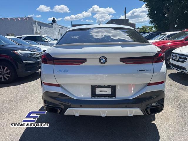 used 2023 BMW X6 car, priced at $56,990