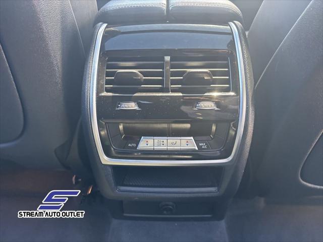 used 2023 BMW X6 car, priced at $56,990