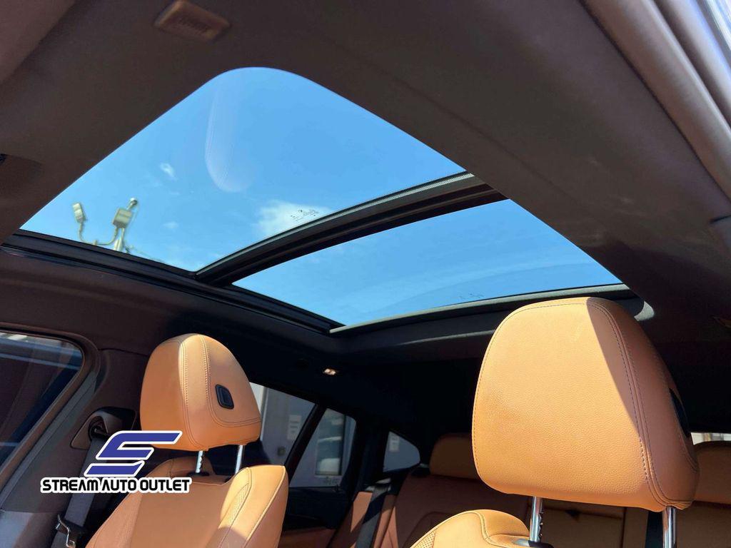used 2023 BMW X4 car, priced at $52,985