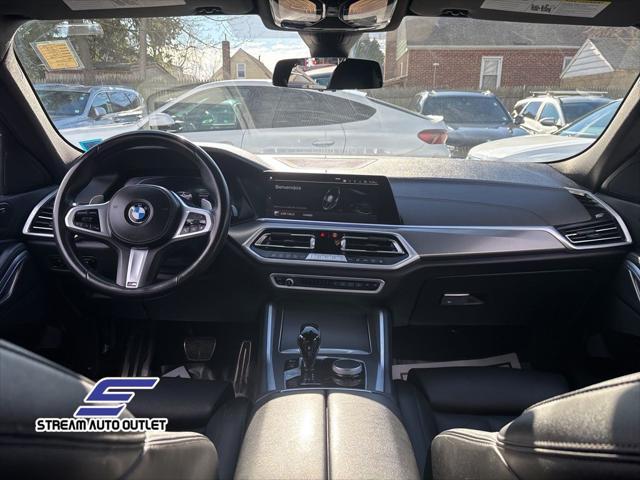 used 2023 BMW X6 car, priced at $55,990