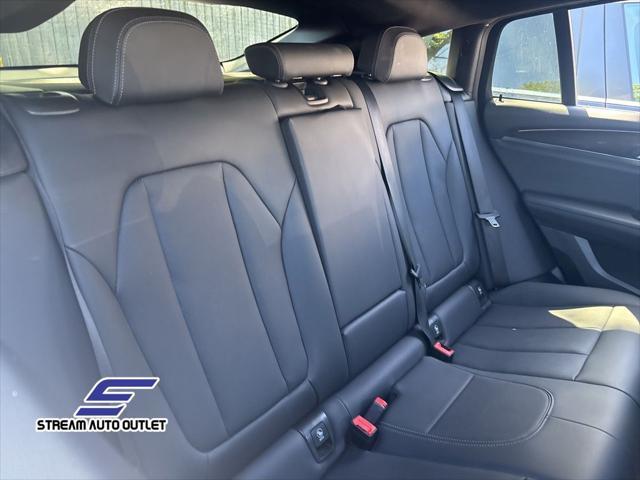 used 2024 BMW X4 car, priced at $38,990