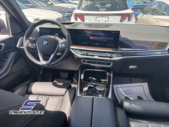 used 2025 BMW X5 PHEV car, priced at $66,990