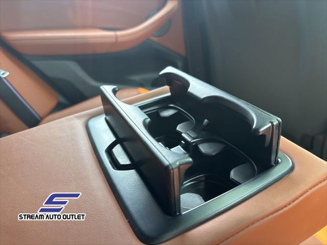 used 2022 BMW X4 M car, priced at $59,990