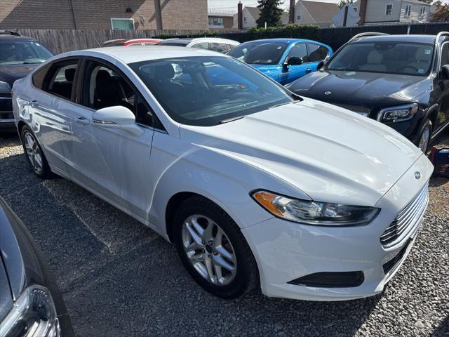 used 2016 Ford Fusion car, priced at $5,995