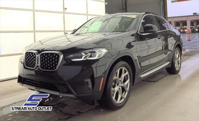 used 2024 BMW X4 car, priced at $35,490