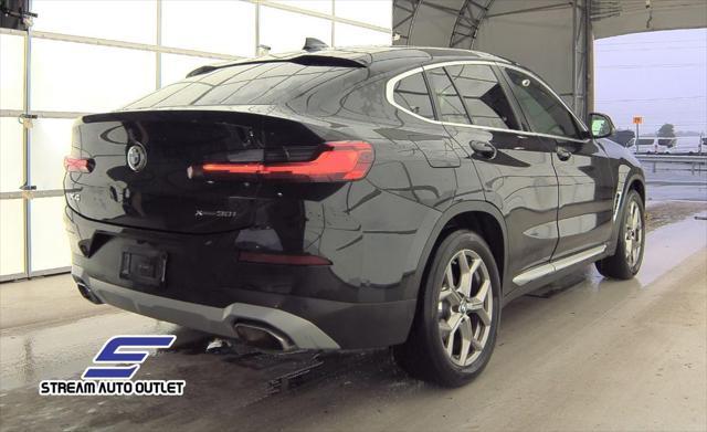 used 2024 BMW X4 car, priced at $35,490
