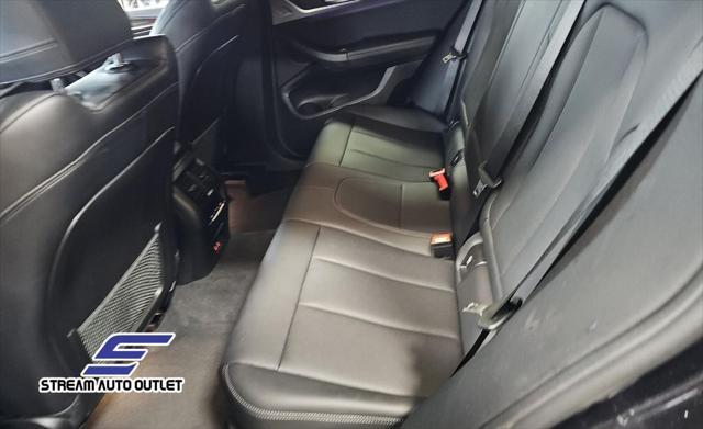 used 2024 BMW X4 car, priced at $35,490