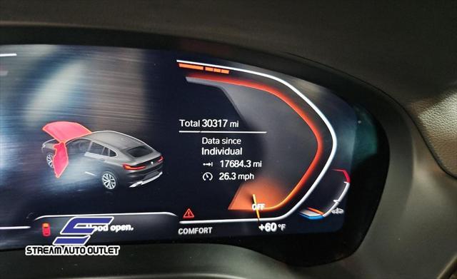 used 2024 BMW X4 car, priced at $35,490