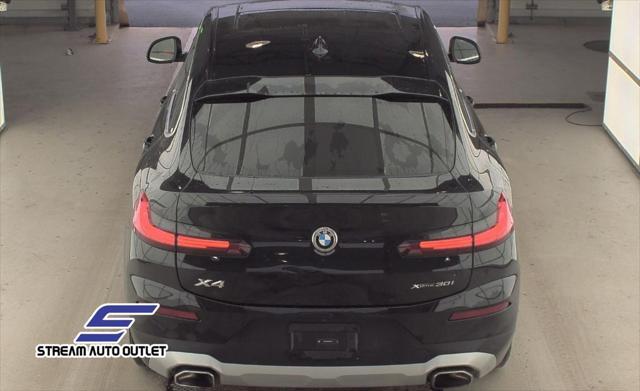 used 2024 BMW X4 car, priced at $35,490