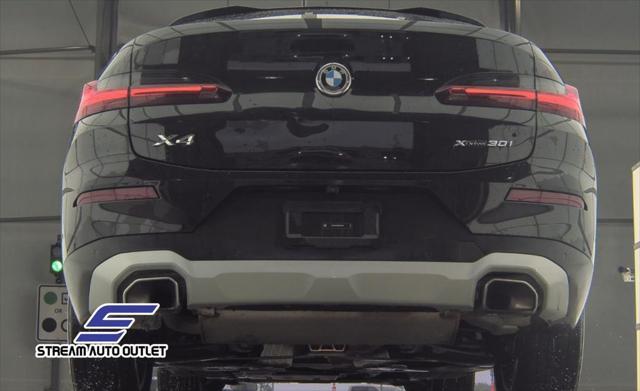 used 2024 BMW X4 car, priced at $35,490
