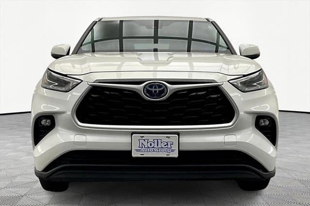 used 2021 Toyota Highlander Hybrid car, priced at $28,633