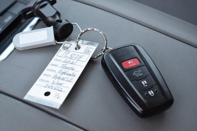 used 2021 Toyota Highlander Hybrid car, priced at $33,059