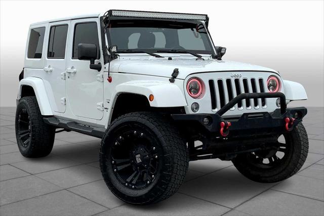 used 2016 Jeep Wrangler Unlimited car, priced at $19,445