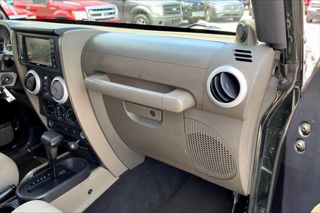 used 2010 Jeep Wrangler Unlimited car, priced at $9,991