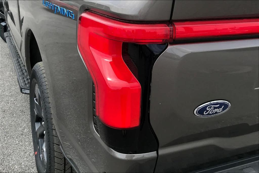 new 2023 Ford F-150 Lightning car, priced at $77,015