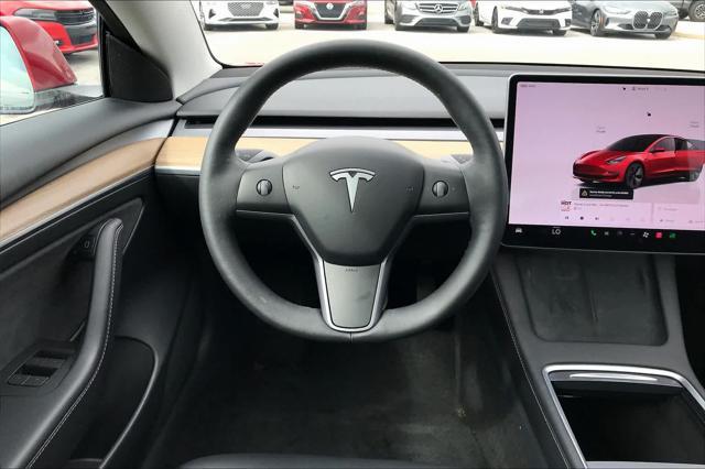 used 2023 Tesla Model 3 car, priced at $27,000