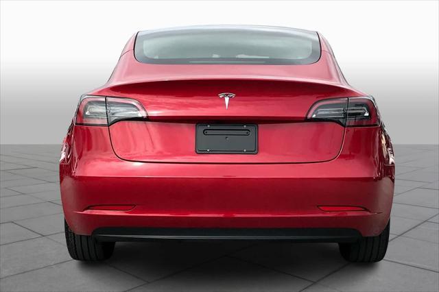 used 2023 Tesla Model 3 car, priced at $27,000