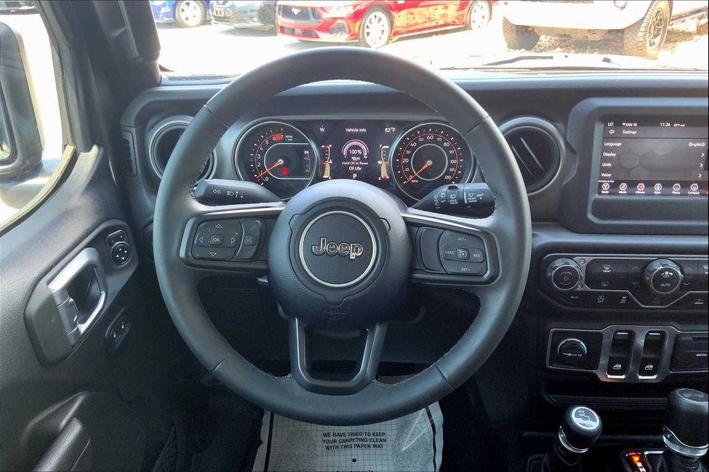used 2023 Jeep Wrangler car, priced at $32,700