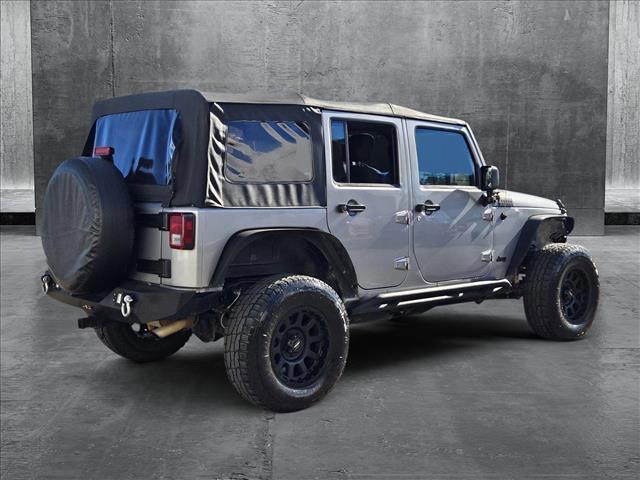 used 2013 Jeep Wrangler Unlimited car, priced at $14,110