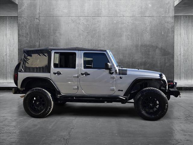 used 2013 Jeep Wrangler Unlimited car, priced at $14,110