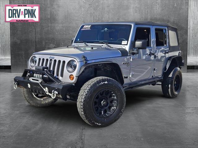 used 2013 Jeep Wrangler Unlimited car, priced at $14,110