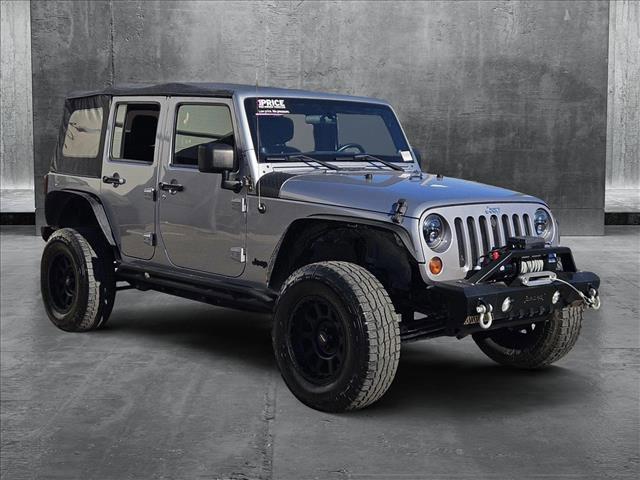 used 2013 Jeep Wrangler Unlimited car, priced at $14,110