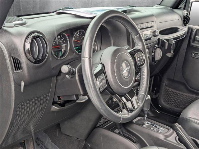 used 2015 Jeep Wrangler Unlimited car, priced at $19,994