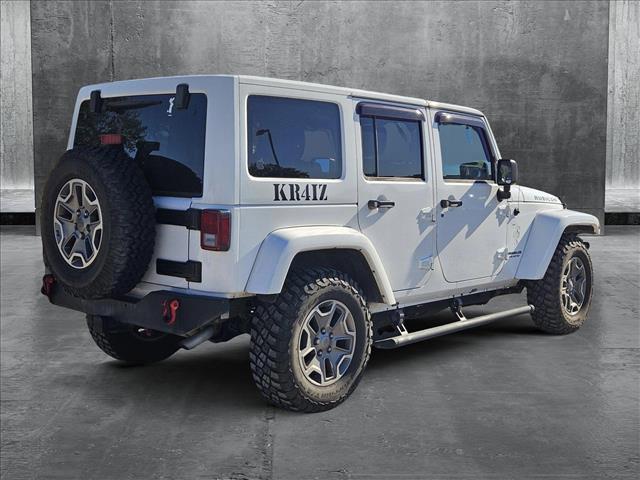 used 2013 Jeep Wrangler Unlimited car, priced at $18,598