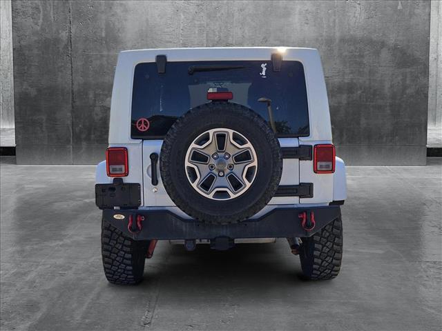 used 2013 Jeep Wrangler Unlimited car, priced at $18,598