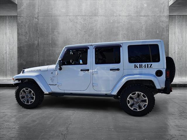 used 2013 Jeep Wrangler Unlimited car, priced at $18,598