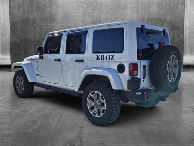 used 2013 Jeep Wrangler Unlimited car, priced at $18,598