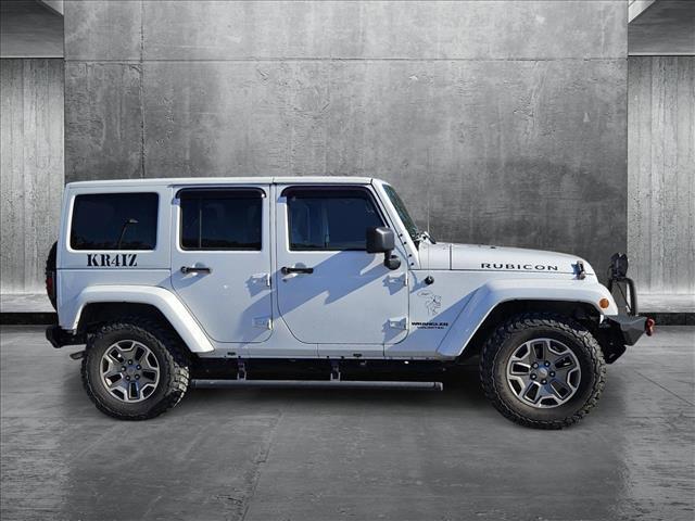 used 2013 Jeep Wrangler Unlimited car, priced at $18,598