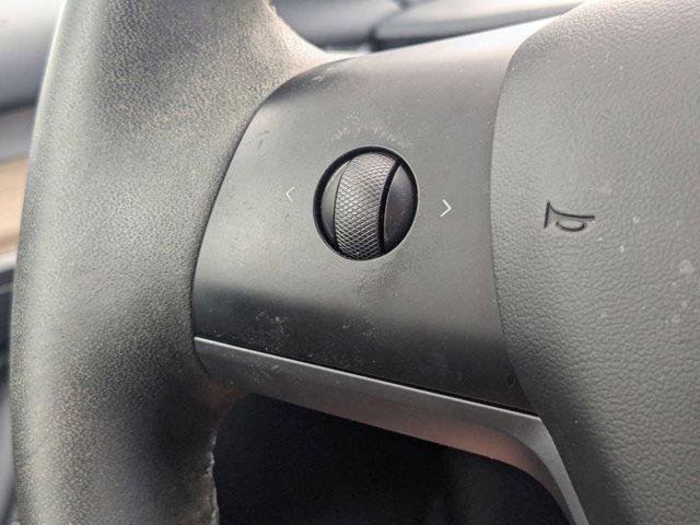 used 2023 Tesla Model 3 car, priced at $27,356