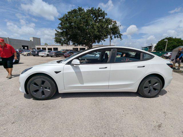 used 2023 Tesla Model 3 car, priced at $27,356