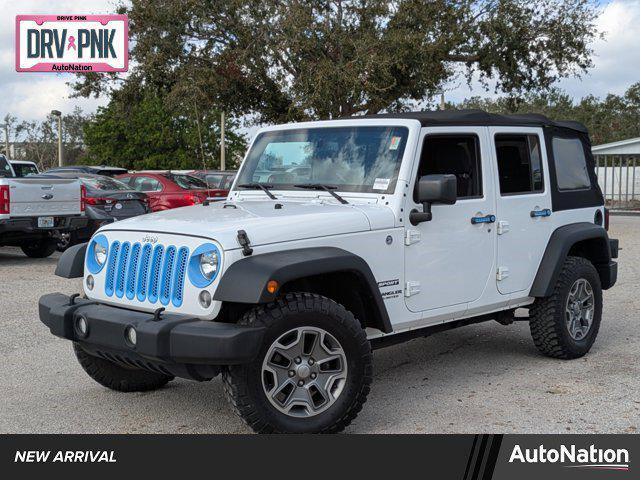 used 2015 Jeep Wrangler Unlimited car, priced at $19,455